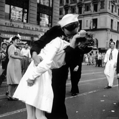 US Sailor Bending Young Nurse over His Arm to Give Her Passionate Kiss in Middle of Times Square Photographic Print by Victor Jorgensen